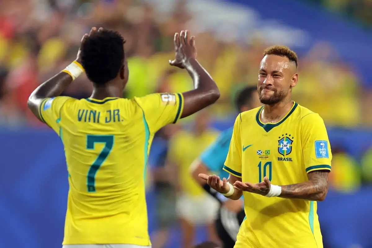 Brazil Neymar high-fives Vinicius to celebrate their clean win