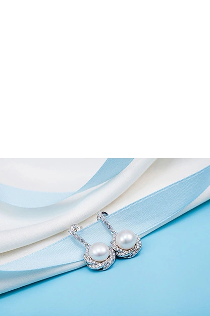 sterling silver earrings with pearl in fashion scene